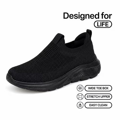 Black knit slip-in sneakers with cushioned dark sole