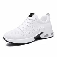 White knit lace-up sneakers with cushioned sole and air-cushion pod detail