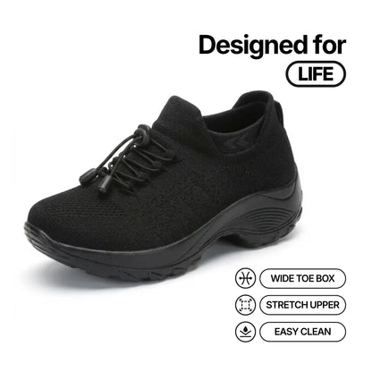 Cloud-Step orthopedic relief shoe: black knit upper, dark sole with cushioned ridges.
