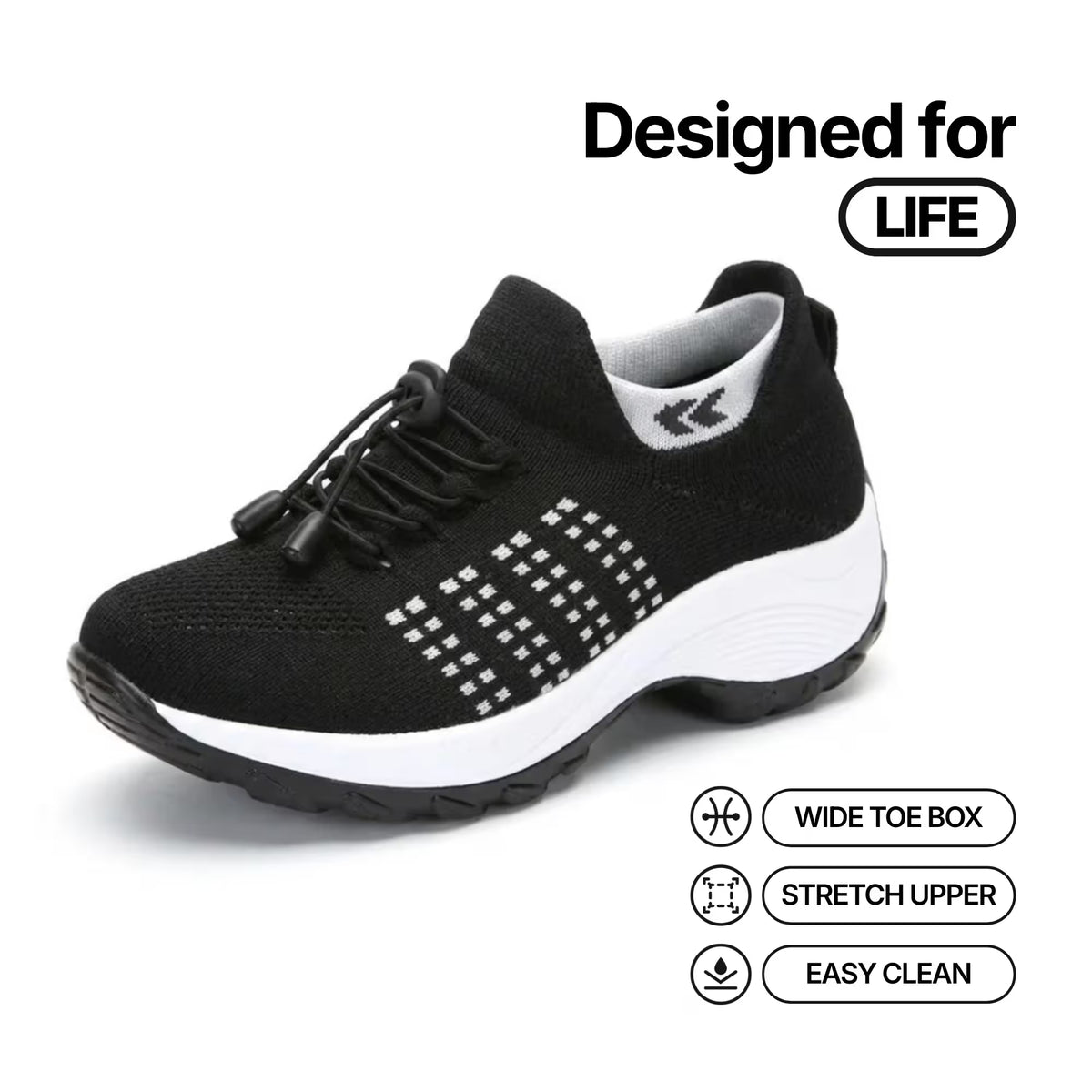 Black knit lace-up sneakers with white midsole and dotted grid detail on the side