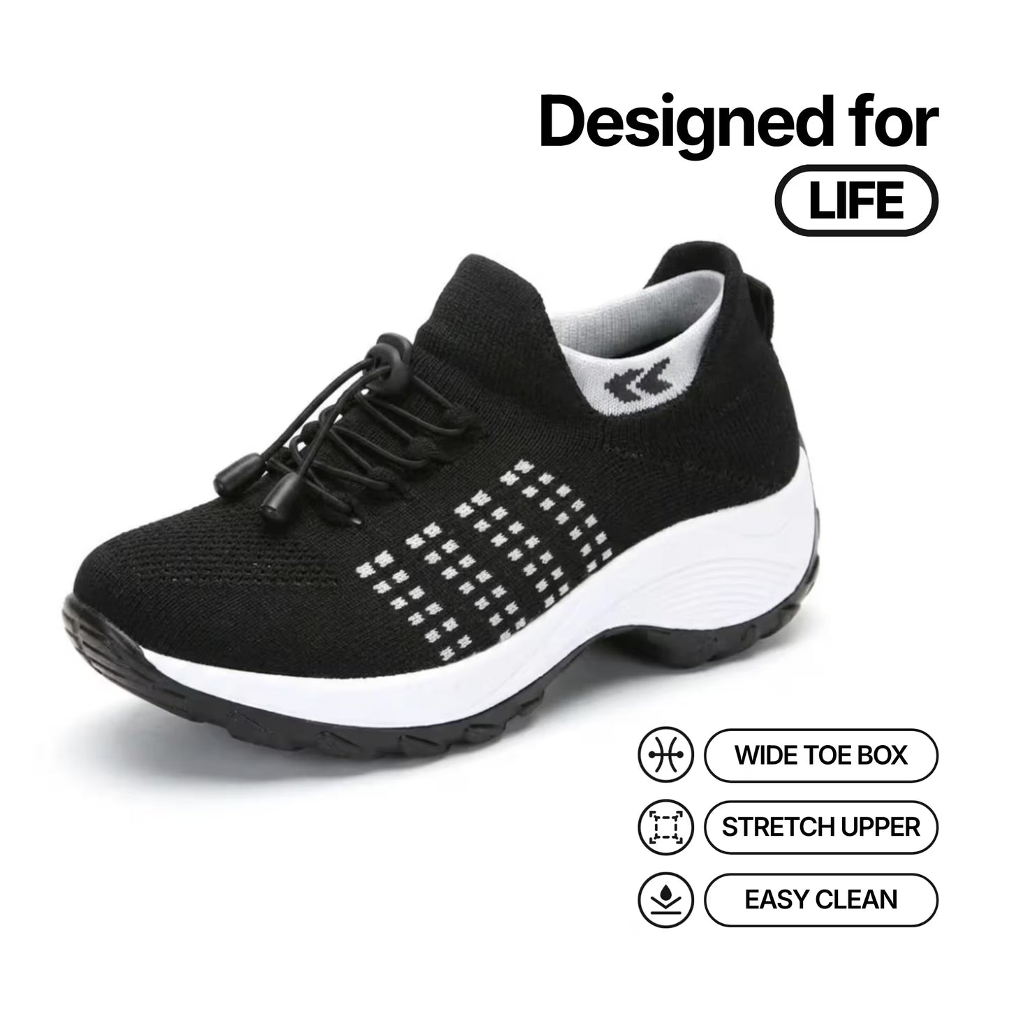 Black knit lace-up sneakers with white midsole and dotted grid detail on the side