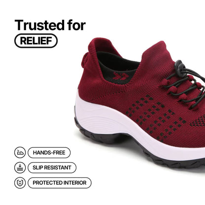 Deep red knit lace-up sneakers with white sole and black grid ventilation pattern
