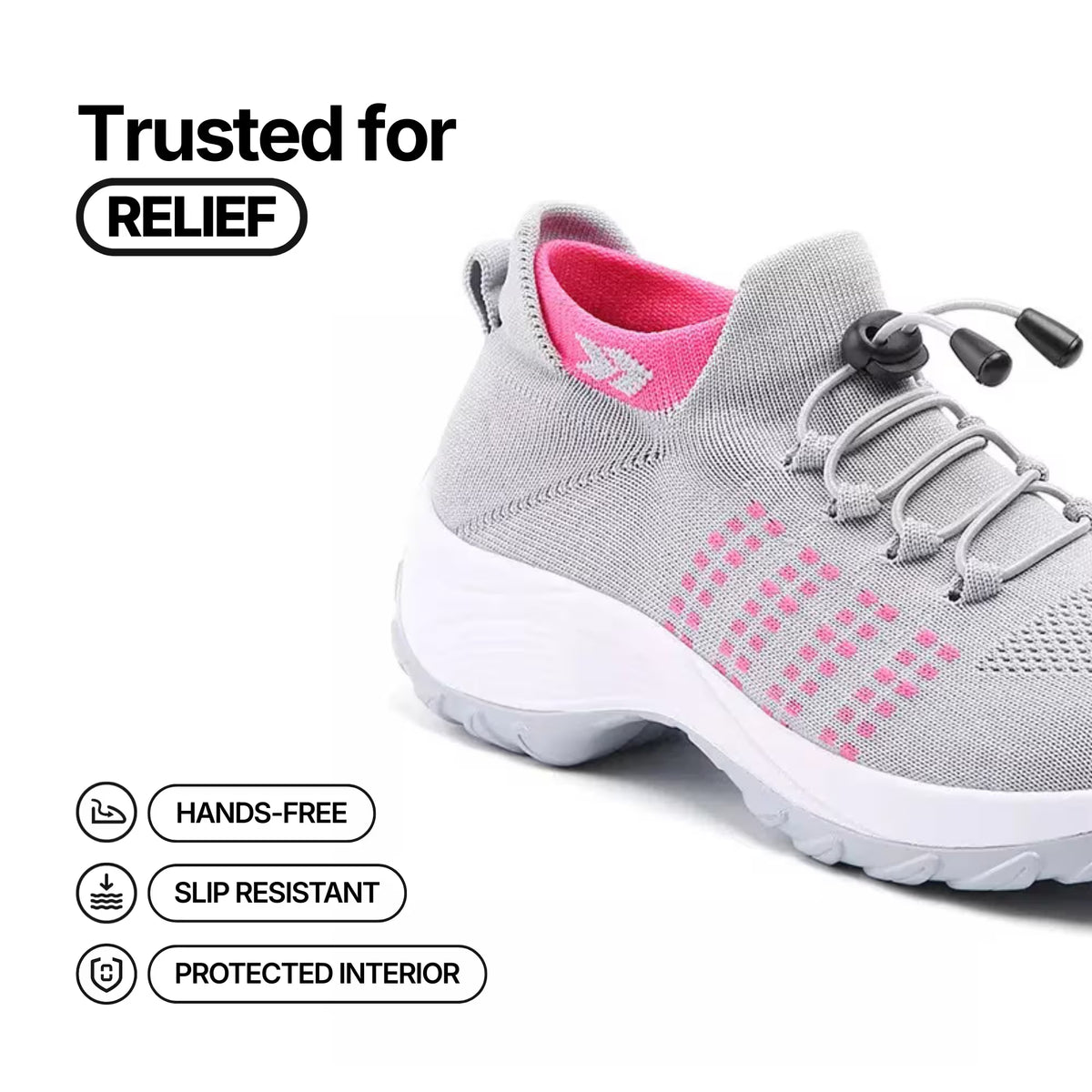Light gray ankle sneaker with pink crosshatch accents, lace-up and grippy outsole